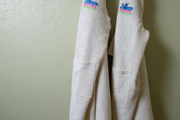 The custom bathrobes are yours to use while our guest in the Lillian Redman Suite.