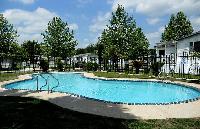 2 swimming pools and cabana available at Beau Village Cottages