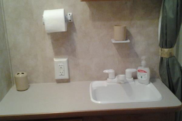 Bathroom sink, counter and med cabinet