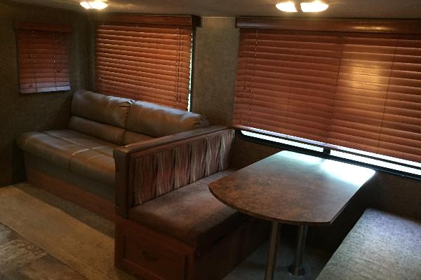 Dinette Table & Couch converts to twin beds with 2