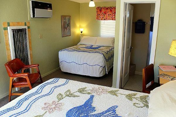 Room 10 features a non-traditional layout, with two comfortable beds for 2-4 people.