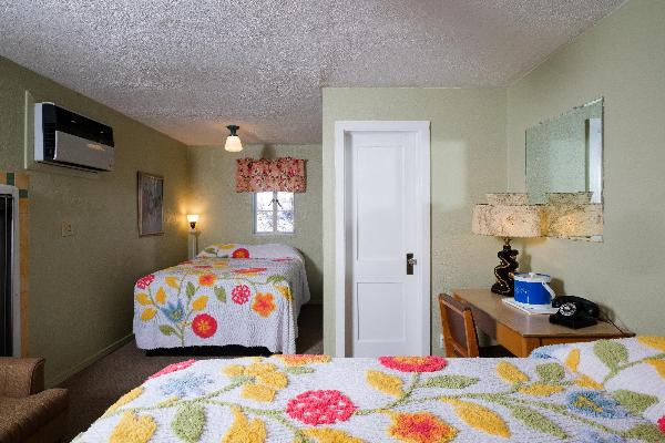 Room 10 features a non-traditional layout, with two comfortable beds for 2-4 people.