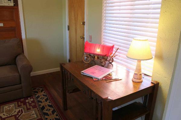 Desk in the parlor is a great place to write postcards to family and friends.