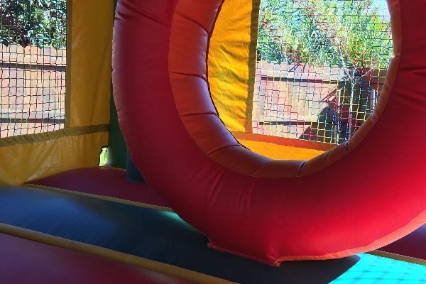 Donut hole and punching posts inside bounce house