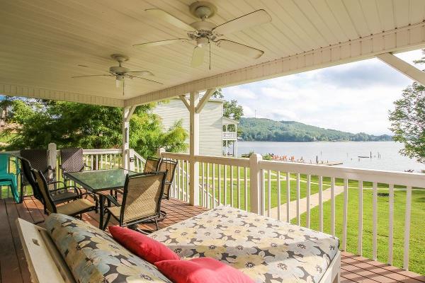 This roomy home boasts gorgeous views and a private pier