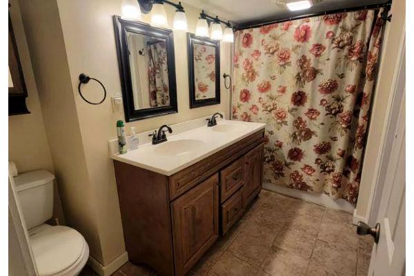 Upstairs bathroom with double vanity