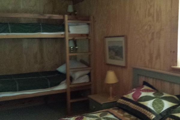 Red Roof Log Cabin Bedroom with set of Bunk Beds