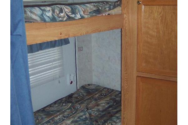 2 Single Bunk Beds in Rear with extra closet space