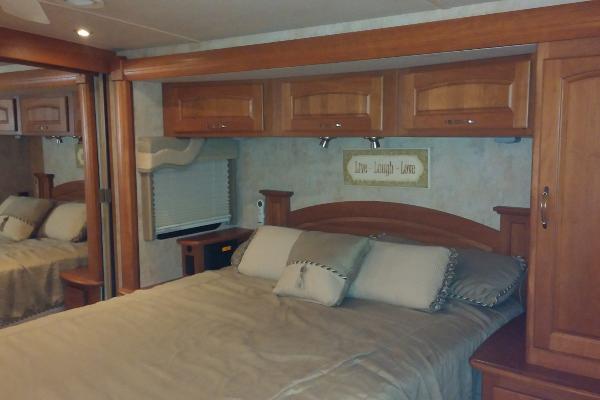 Queen Island Masterbed with lots of wardrobe closets, cabinet and drawer space