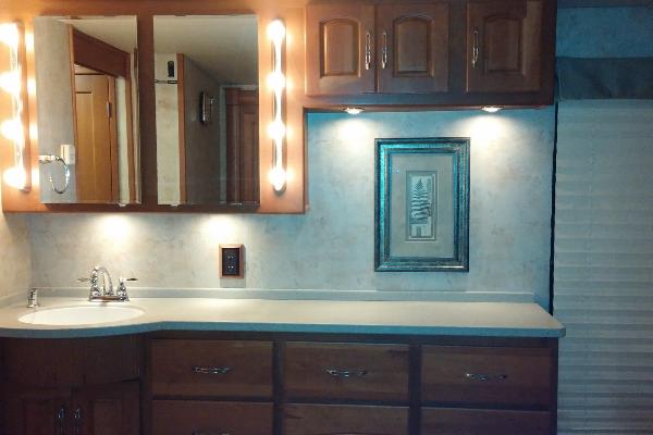 Sink, Mirror and Cabinets in Master Bedroom