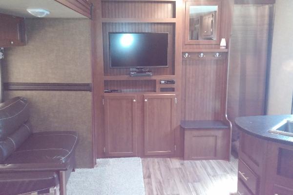 Very spacious inside due to slide-out, 32' Flat Screen TV w/DVD Player, AM/FM Stereo w/CD/Aux/USB inputs