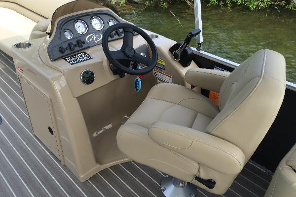Captains chair and helm.  Bluetooth audio and full instrumentation.